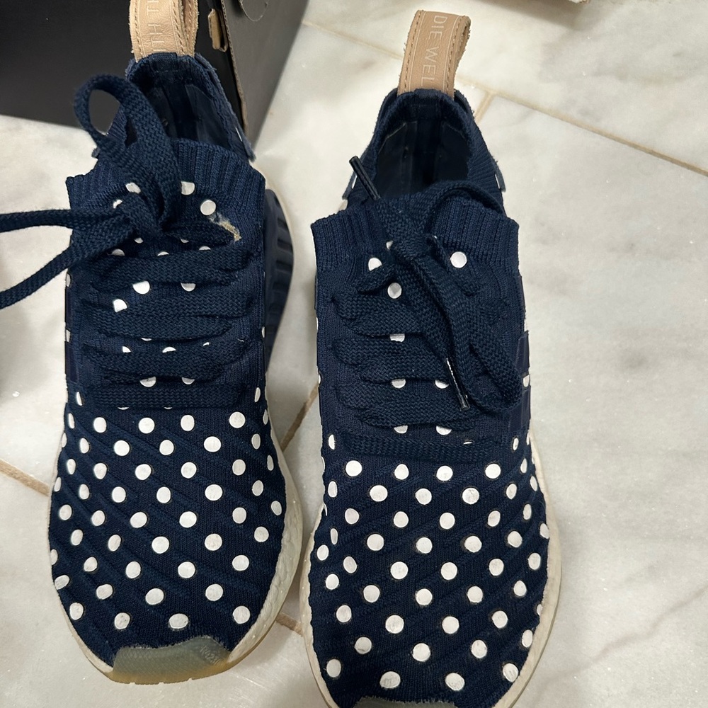 Blue adidas NMD blue with dots.
